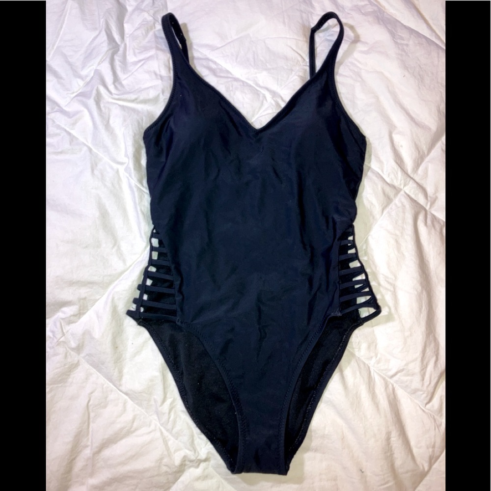 One price black bathing suit with cutouts